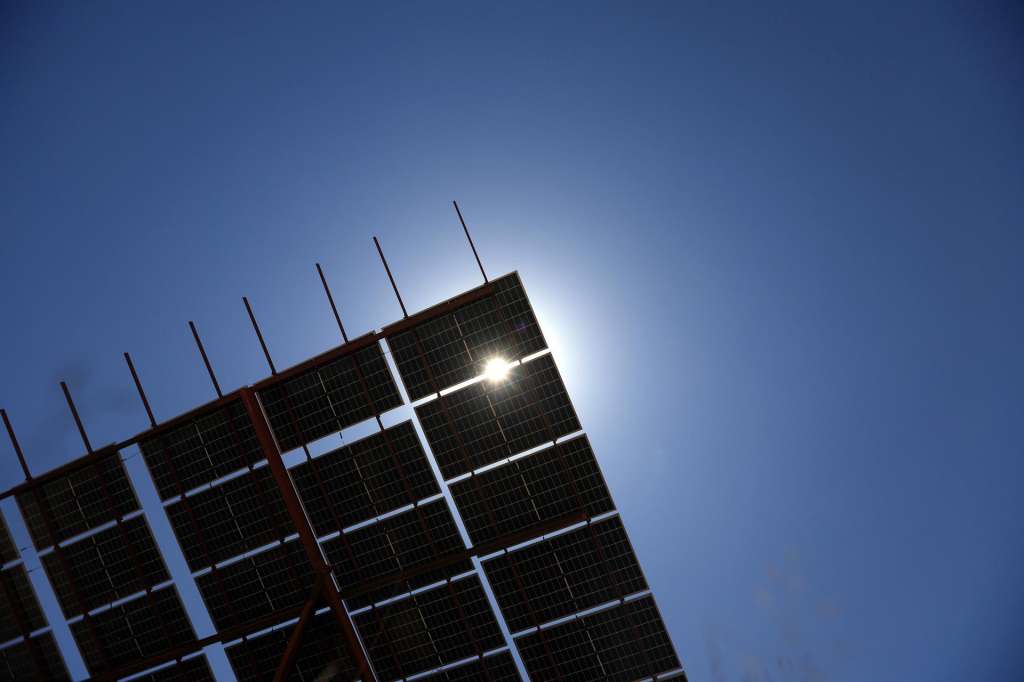 SANA'A (Yemen), 22/04/2025.- The Sun's light breaks through an array of solar power panels on Earth Day, at a valley in Sana'a, Yemen, 22 April 2025. Earth Day is celebrated annually on 22 April, with this year's theme being 'Our Power, Our Planet'. EFE/EPA/YAHYA ARHAB