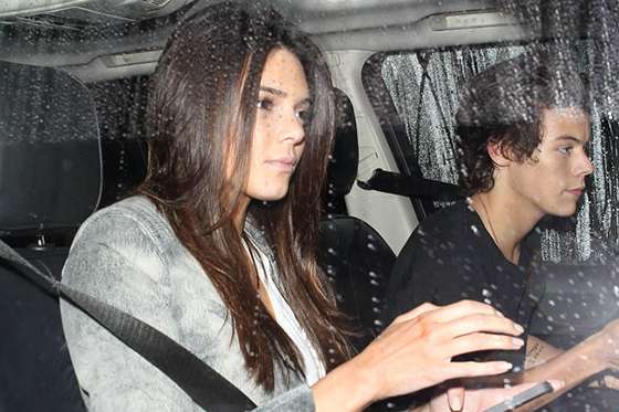 UK CLIENTS MUST CREDIT: AKM-GSI ONLY<BR/>
West Hollywood, CA - New couple alert?! Harry Styles and Kendall Jenner depart Craig's Restaurant after joining each other for a low key dinner date. The One Direction frontman and the 18-year-old reality star/model opted for the private backdoor exit from the restaurant on a rare rainy night in West Hollywood.
<P>
Pictured: Kendall Jenner, Harry Styles
<B>Ref: SPL655138 201113 </B><BR/>
Picture by: AKM-GSI / Splash News<BR/>
</P><P>