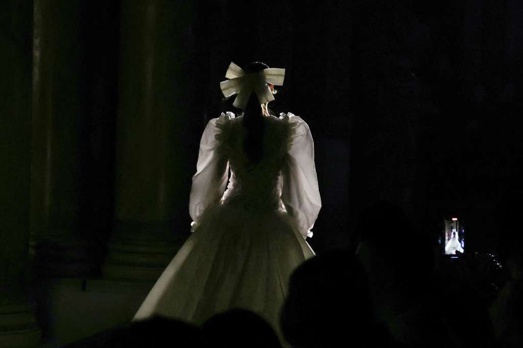 A model presents a creation by Chanel during the Haute-Couture Fall/Winter 2024 show as part of the Paris Fashion Week at Palais Garnier (Opera national de Paris) opera house in Paris on June 25, 2024. (Photo by Alain JOCARD / AFP)
