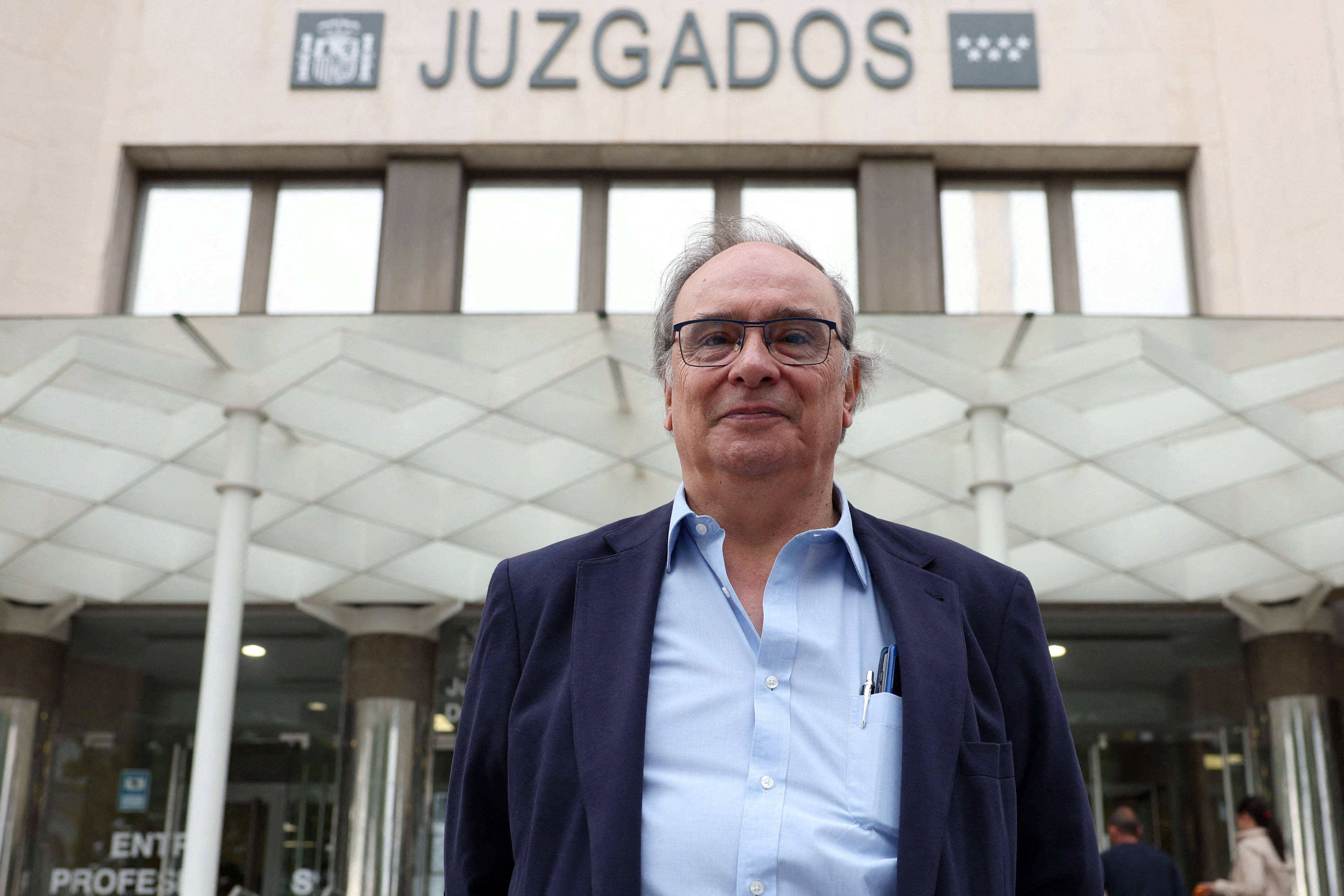 Franco dictatorship victim Julio Pacheco Yepes poses outside the courthouse prior to his hearing in Madrid on September 15, 2023. Just months before the death of Spanish dictator Francisco Franco in 1975, Julio Pacheco Yepes says he was arrested and tortured by police for belonging to a left-wing underground movement that opposed the regime. Now, nearly five decades on, Pacheco Yepes is set -- at a hearing that opens today -- to become the first victim of the Franco dictatorship to testify before a Spanish judge investigating allegations of torture. (Photo by Pierre-Philippe MARCOU / AFP)