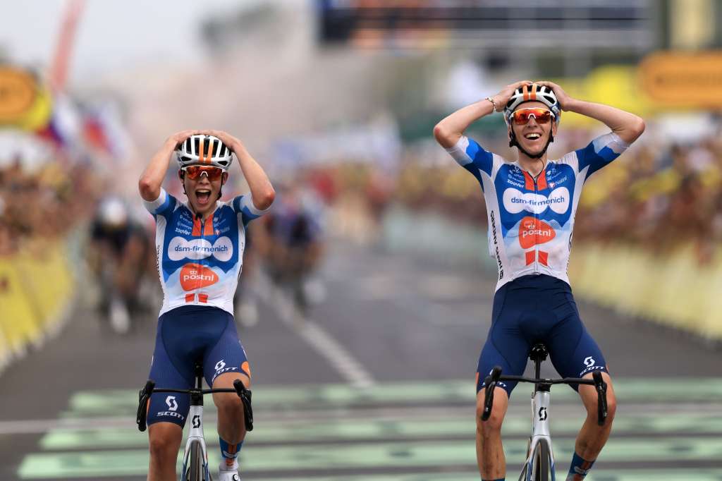 Rimini (Italy), 29/06/2024.- French rider Romain Bardet (R) of Team DSM reacts as he crosses the finish line next to his teammate Dutch rider Frank van den Broek (L) to win the first stage of the 2024 Tour de France cycling race over 206km from Florence to Rimini, Italy, 29 June 2024. (Ciclismo, Francia, Italia, Florencia) EFE/EPA/GUILLAUME HORCAJUELO