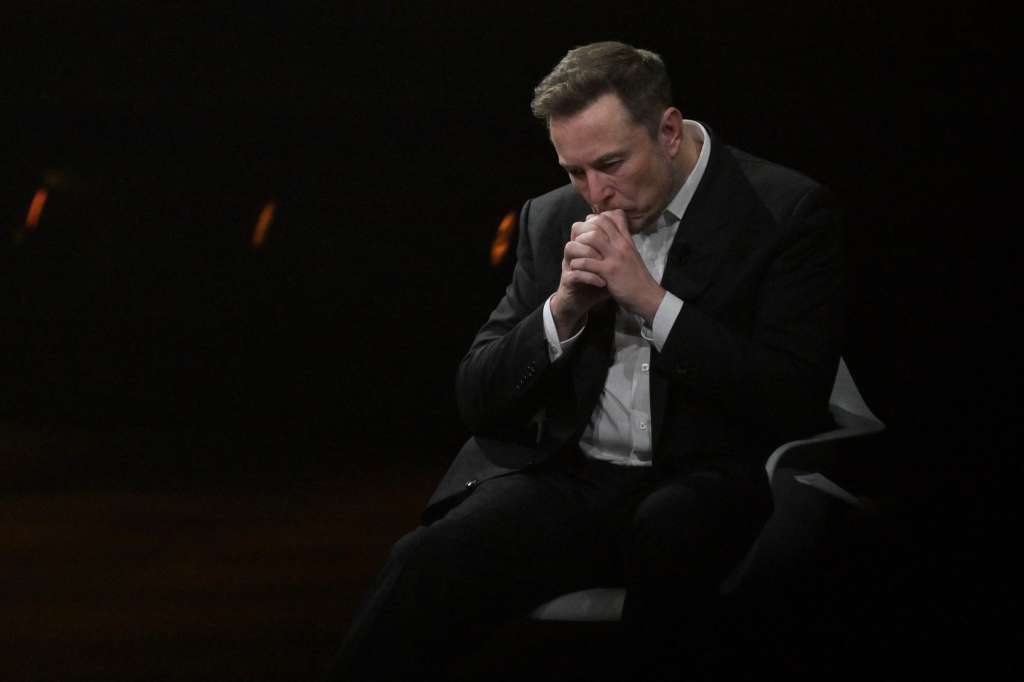 (FILES) SpaceX, Twitter and electric car maker Tesla CEO Elon Musk reacts as he visits the Vivatech technology startups and innovation fair at the Porte de Versailles exhibition center in Paris, on June 16, 2023.