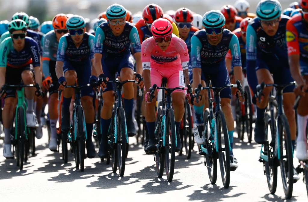 Pink jersey, Bahrain - Victorious Portuguese rider Afonso Eulalio rides with the pack during the 6th stage of the Giro d'Italia 2026 - Tour of Italy cycling race between Paestum and Naples, southern Italy on May 14, 2026. (Photo by Luca Bettini / AFP)