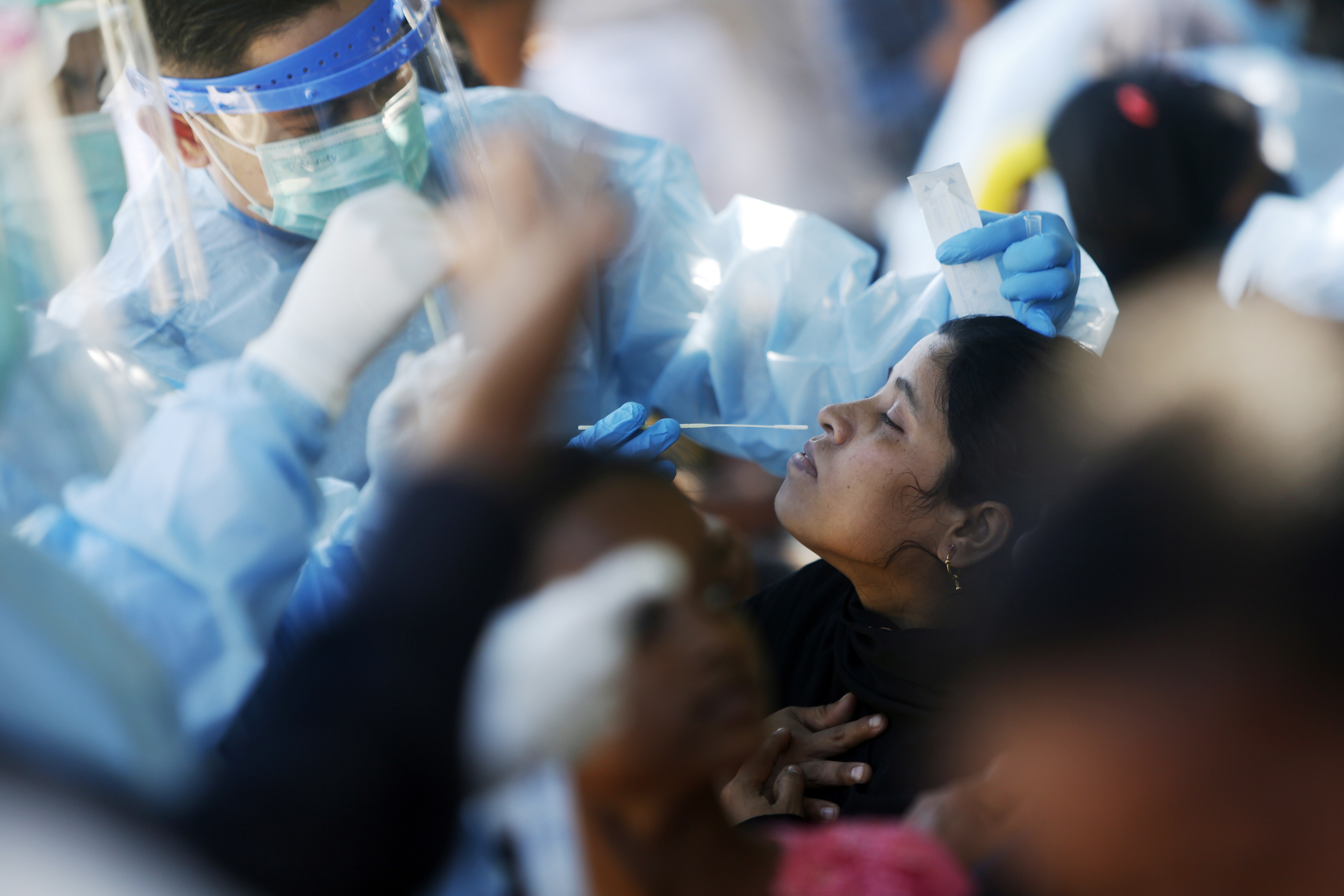 Ladong (Indonesia), 09/01/2023.- Rohingya refugees get a COVID-19 test at their temporary shelter provided by the Aceh local government, in Ladong, Aceh Besar, Indonesia, 09 January 2023. The head of Public Relations of the Aceh Police Joko Krisdiyanto said that a boat with 185 Rohingya refugees landed on the shores of Indonesia's Aceh province on 08 January 2023, following hundreds who arrived late last year fleeing desperate conditions in refugee camps in Bangladesh. EFE/EPA/HOTLI SIMANJUNTAK
