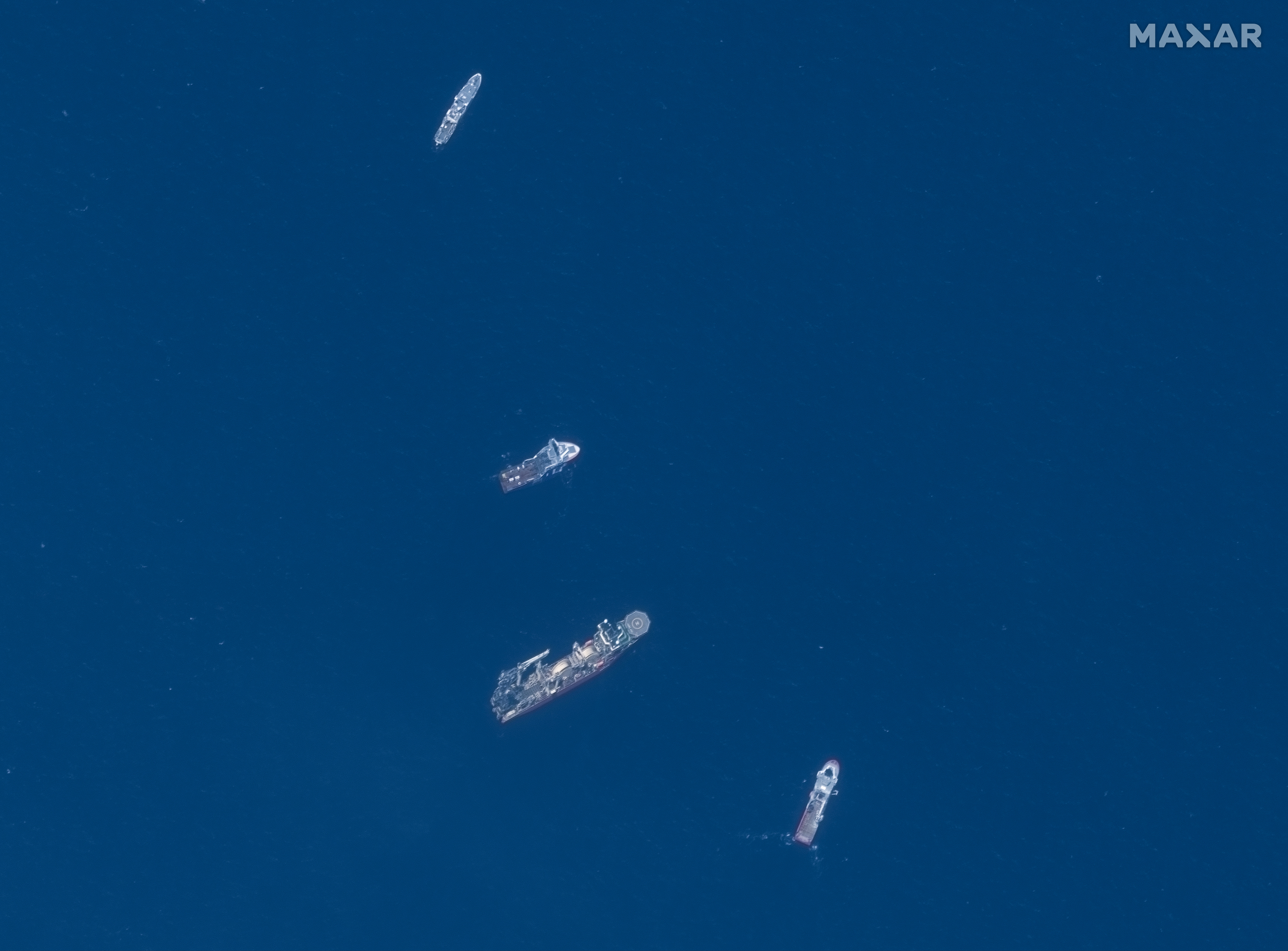 At Sea (-), 22/06/2023.- A handout satellite image made available by Maxar Technologies shows the search and rescue operations associated with the missing Titan submersible near the wreck of the Titanic in the Atlantic Ocean, 22 June 2023. The US Coast Guard, along with Canadian authorities, is searching the ocean depths for a submersible with Ocean Gate Expeditions, carrying tourists visiting the Titanic wreckage, 900 miles (1500 km) off the coast of Cape Cod, that lost contact on 18 June 2023. EFE/EPA/MAXAR TECHNOLOGIES / HANDOUT -- MANDATORY CREDIT: SATELLITE IMAGE 2023 MAXAR TECHNOLOGIES -- THE WATERMARK MAY NOT BE REMOVED/CROPPED -- BEST QUALITY AVAILABLE -- HANDOUT EDITORIAL USE ONLY/NO SALES