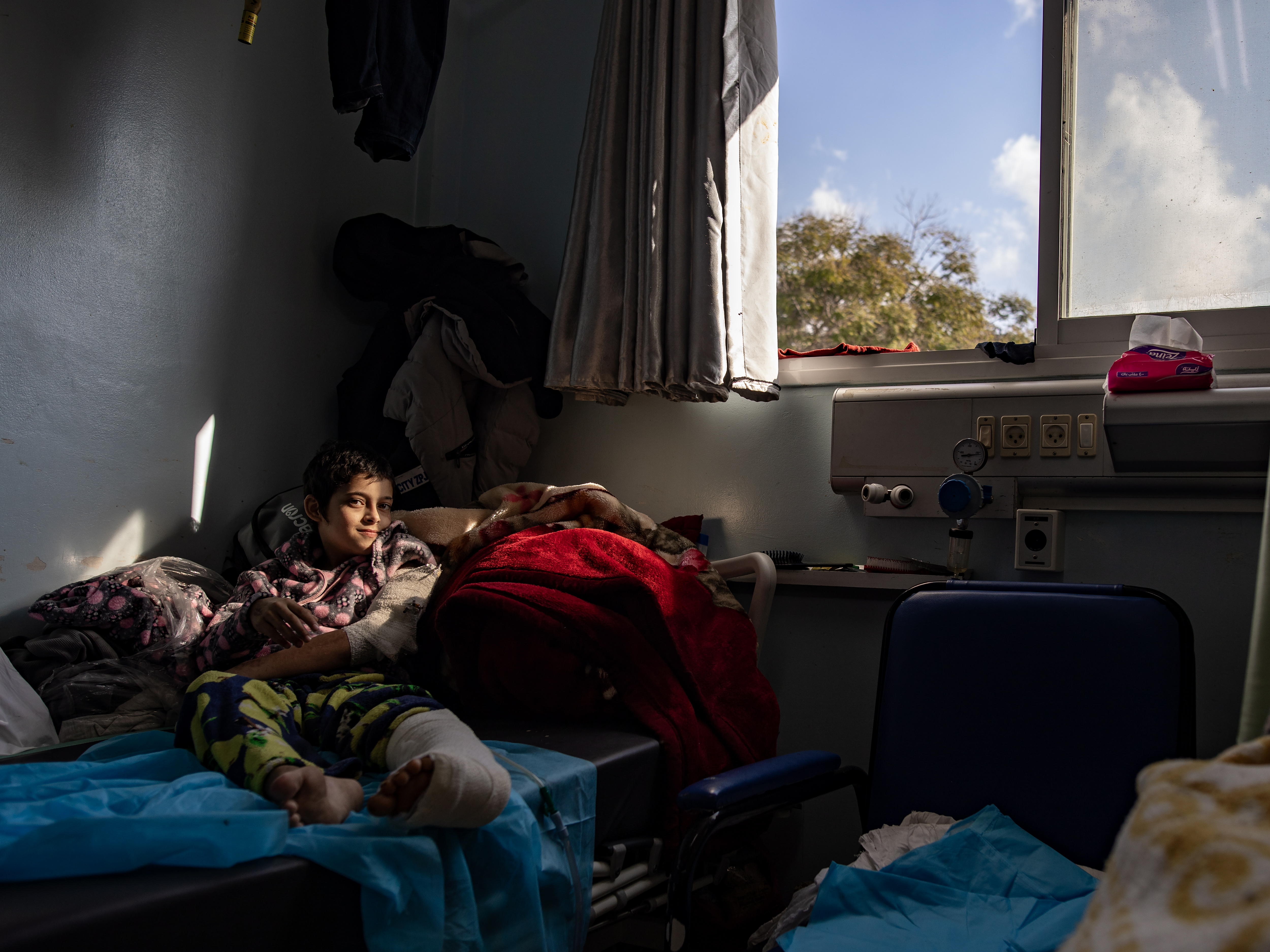 Rafah (-), 06/01/2024.- Eleven Years old Palestinian girl Maryam Riyati sits in her hospital at the European Hospital in Khan Yunis, Southern Gaza Strip, 06 January 2024.(Issued 12 January 2024). Maryam said that the doctors told her she had serious injuries to her foot and hand, that she used to live in Khan Younis, and that her brother and 21 other members of her family were killed when their home was hit by a strike on 09 December 2023. When she woke up, she found herself in the intensive care unit of the hospital. Her wish is to see the end of the fighting, to recover from her injuries, and to go back to school and to a normal life some day soon. More than 23,600 Palestinians and at least 1,300 Israelis have been killed, according to the Palestinian Health Ministry and the Israel Defense Forces (IDF), since Hamas militants launched an attack against Israel from the Gaza Strip on 07 October, and the Israeli operations in Gaza and the West Bank which followed it. EFE/EPA/HAITHAM IMAD