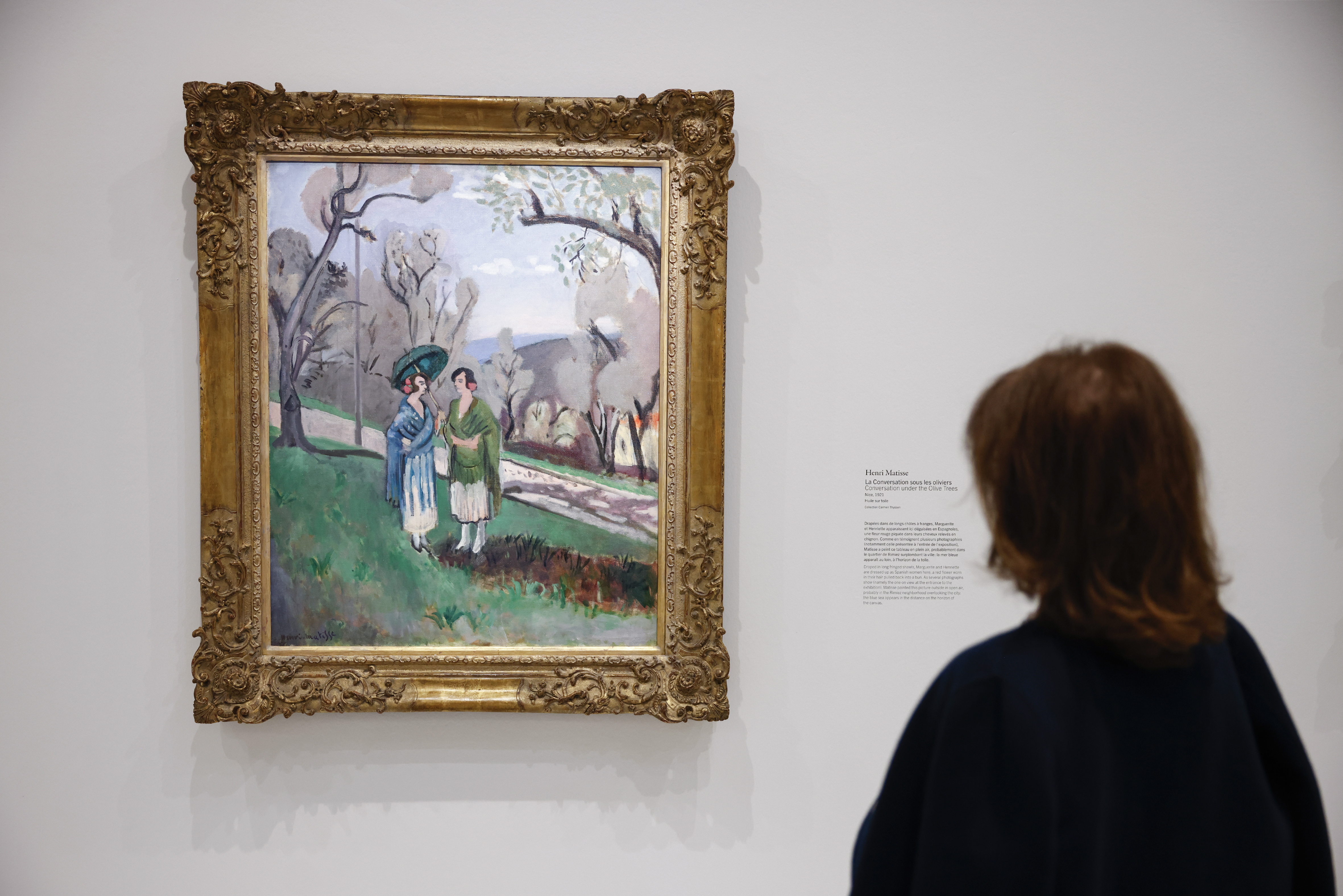 Paris (France), 03/04/2025.- A woman looks at a painting entitled ‘Conversation under the Olive trees’ by French painter Henri Matisse on display during the exhibition ‘Matisse and Marguerite, Through Her Father's Eyes’ at the Museum of Modern Art in Paris, France, 03 April 2025. The exhibition runs from 04 April to 24 August 2025. (Francia) EFE/EPA/YOAN VALAT