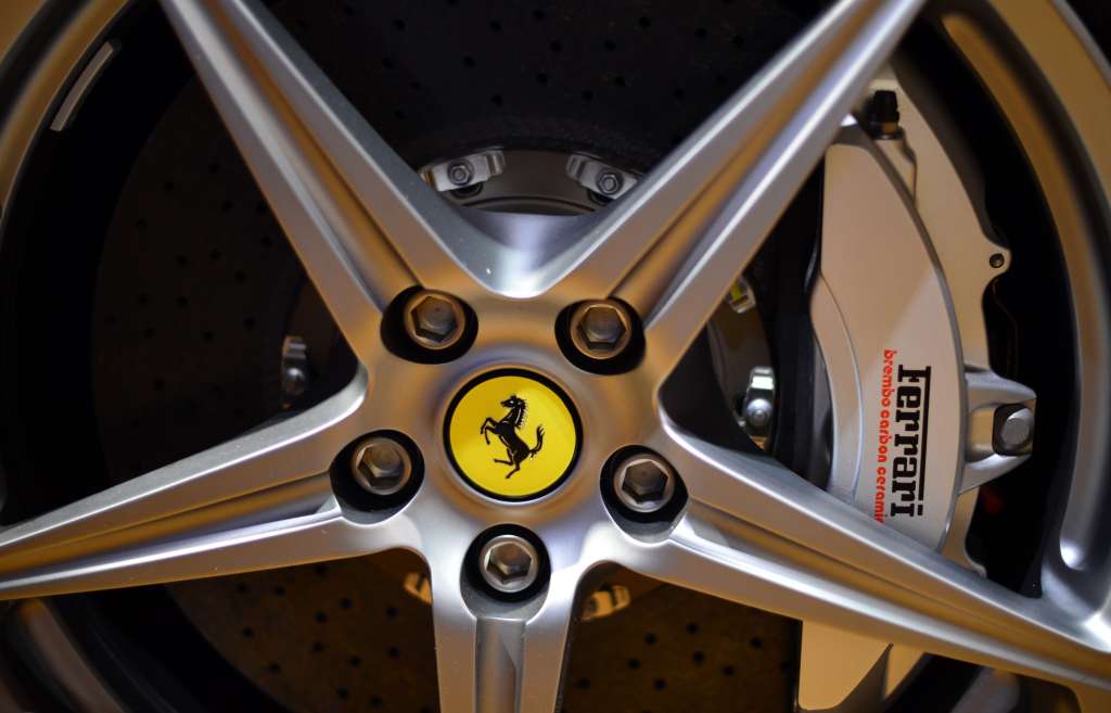 A wheel is displayed in the 'tailor-made' department of the Ferrari factory where the hand-finished road vehicles are being produced on December 5, 2012 in Maranello. The Ferrari 45 buildings's factory, where more than 3,000 workers produce the company�s GT and Formula 1 cars is based in Maranello. AFP PHOTO / GABRIEL BOUYS