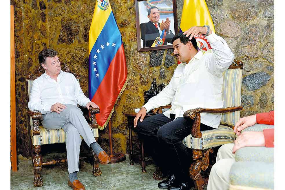 Los presidentes de Colombia y Venezuela, Juan Manuel Santos y Nicolás Maduro, en el encuentro binacional el 22 de julio de 2013. / Presidencia