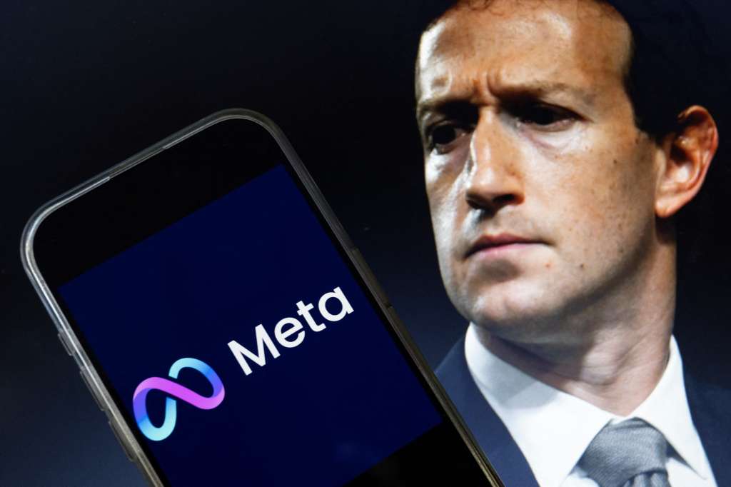 (FILES) This photo illustration created on January 7, 2025, in Washington, DC, shows an image of Mark Zuckerberg, CEO of Meta, and an image of the Meta logo.
