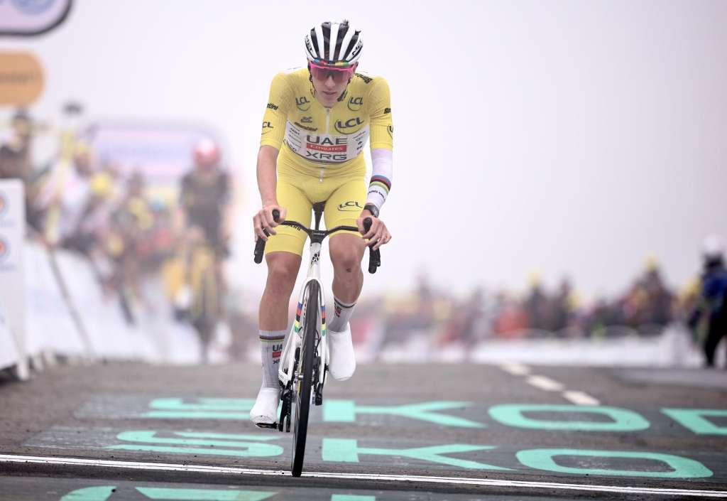 Luchon-Superbagneres (France), 19/07/2025.- Yellow jersey overall leader Slovenian rider Tadej Pogacar of UAE Team Emirates crosses the finish line of the 14th stage of the Tour de France cycling race over 182.6km from Pau to Luchon-Superbagneres, France, 19 July 2025. (Ciclismo, Francia) EFE/EPA/CHRISTOPHE PETIT TESSON