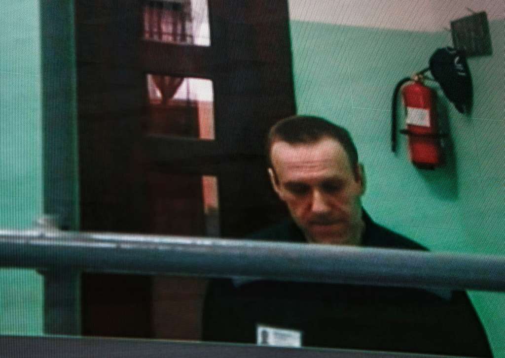 Moscow (Russian Federation), 22/06/2023.- Russian opposition figure Alexei Navalny is seen on a screen via a video link from his penal colony during a hearing about his right to correspond while in jail, at the Russian Supreme court in Moscow, Russia, 22 June 2023. The Supreme Court of the Russian Federation recognized as lawful the internal regulations of correctional institutions on the issuance of writing materials to persons held in punishment cells. Navalny has been in the colony since February 2021, when the court, at the request of the Federal Penitentiary Service, replaced his suspended sentence in the Yves Rocher case of 2014 with a real one. He was supposed to serve in a penal colony for 2 years and 8 months, but in March 2022, the Lefortovo Court of Moscow, at an off-site meeting in correctional colony-2 in the city of Pokrov, Vladimir Region, sentenced the politician to 9 years of strict regime and a fine of 1.2 million rub., as well as one and a half years of restriction of freedom in the case of fraud and contempt of court. In June 2022, the sentence entered into force. (Rusia, Moscú) EFE/EPA/SERGEI ILNITSKY