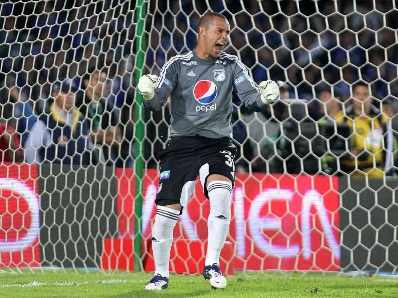 La noche del 16 de diciembre de 2012, Luis Delgado fue la figura en la obtención de la estrella 14 y quedó en la historia de Millonarios. / EFE