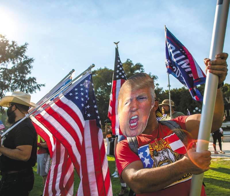 Simpatizantes apoyando al presidente Donald Trump / AFP / Apu GOMES