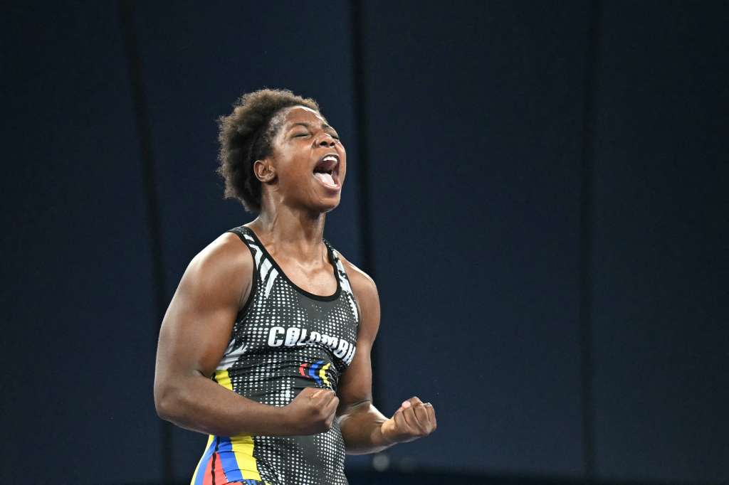 Colombia's Tatiana Renteria Renteria reacts after beating Ecuador's Genesis Rosangela Reasco Valdez in their women's freestyle 76kg wrestling bronze medal match at the Champ-de-Mars Arena during the Paris 2024 Olympic Games, in Paris on August 11, 2024. (Photo by Punit PARANJPE / AFP)