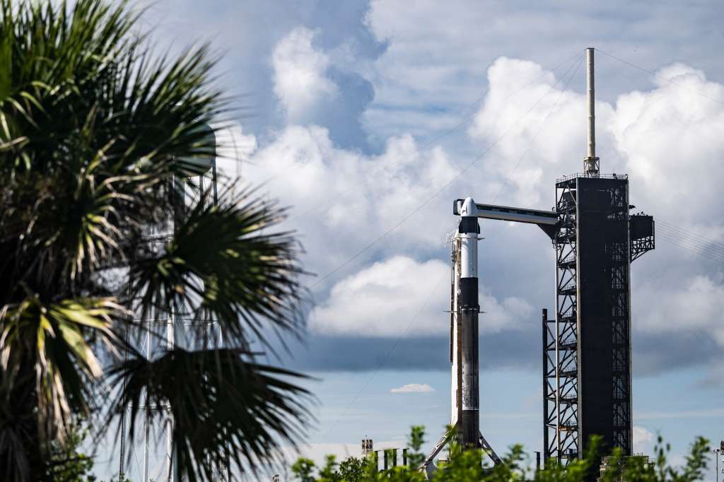 A SpaceX Falcon 9 rocket with the Crew Dragon Resilience capsule sits on Launch Complex 39A at Kennedy Space Center ahead of the Polaris Dawn Mission due to launch on August 27 at the Kennedy Space Center in Florida, on August 26, 2024.