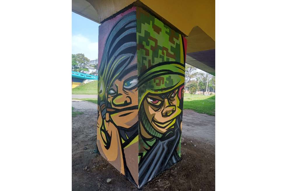 Esta imagen corresponde a los otros dos lados del mural realizado por el colectivo Saint Cat Crew .