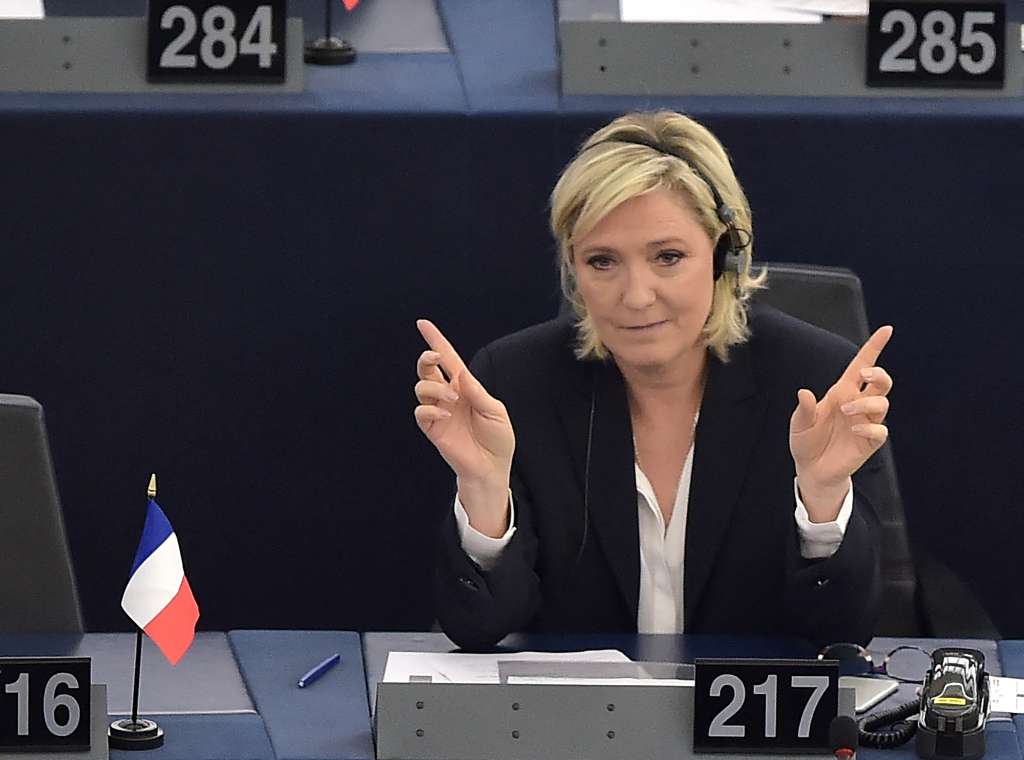 (FILES) French far-right party Front National (FN) President and member of the European Parliament, Marine Le Pen, gestures during a debate on the consequences of the Brexit at the European Parliament in Strasbourg, eastern France, on July 5, 2016.