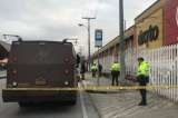 Roban dos tulas con dinero de carro de valores en Bogotá