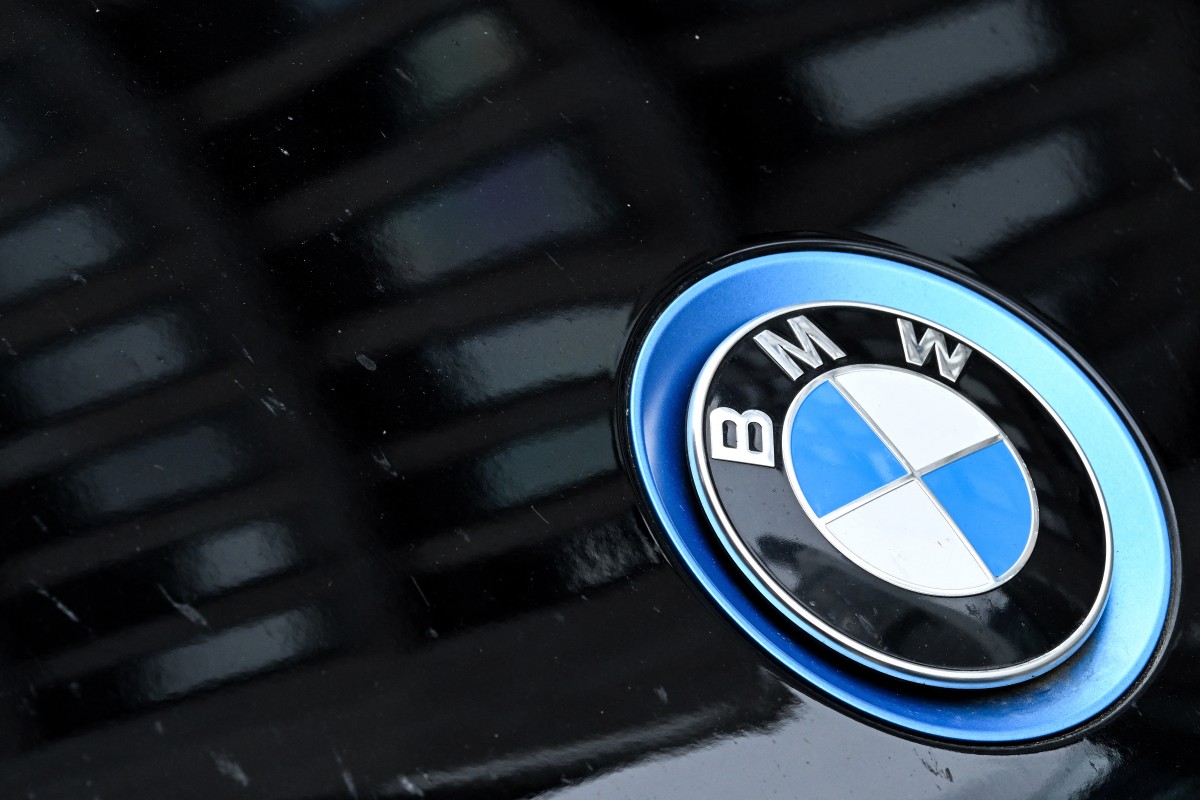A logo of German automotive brand BMW is pictured on BMW car in Frankfurt am Main, western Germany, on May 5, 2026.