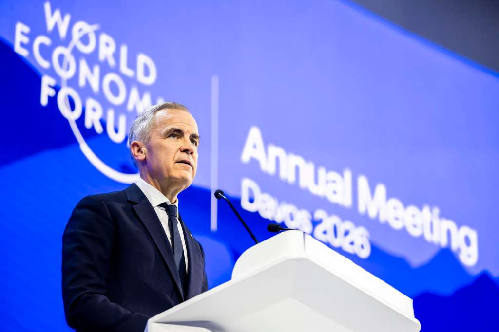 DAVOS (Switzerland), 20/01/2026.- Canada Prime Minister Mark Carney speaks during a plenary session in the Congress Hall at the 56th annual meeting of the World Economic Forum (WEF) in Davos, Switzerland, 20 January 2026. The 2026 summit, running from 19 to 23 January and held under the theme 'A Spirit of Dialogue,' brings together global political leaders, corporate executives, and scientists to address international challenges. (Suiza) EFE/EPA/GIAN EHRENZELLER