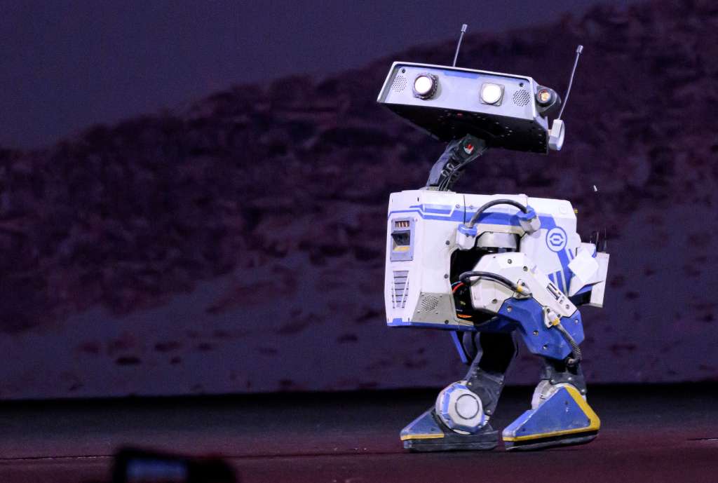 A robot arrives on stage as Nvidia CEO Jensen Huang introduces new products during a keynote session at the SAP Center in San Jose, California, on March 18, 2025. (Photo by JOSH EDELSON / AFP)