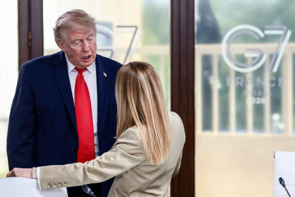 (FILES) US President Donald Trump speaks with Italy's Prime Minister Giorgia Meloni during a work lunch as part of the G7 summit, in Evian, eastern France, on June 16, 2026. Italy's foreign minister on June 19, 2026 said he was cancelling a visit to the United States over reported comments by US President Donald Trump that appeared to mock Prime Minister Giorgia Meloni.