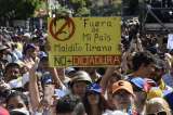 Venezolanos marchan para exigir entrada de ayuda bloqueada por Maduro