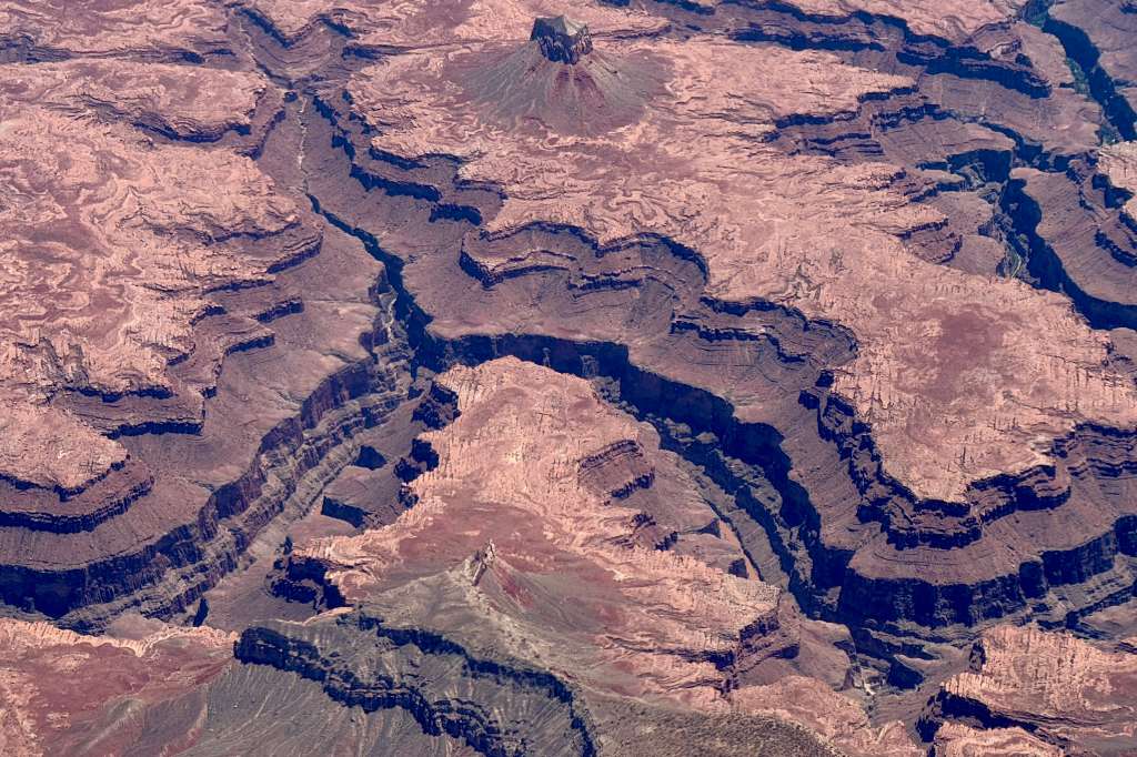 (FILES) This aerial view taken on July 7, 2025 shows part of the Grand Canyon in Arizona, including several bends of the Colorado River.