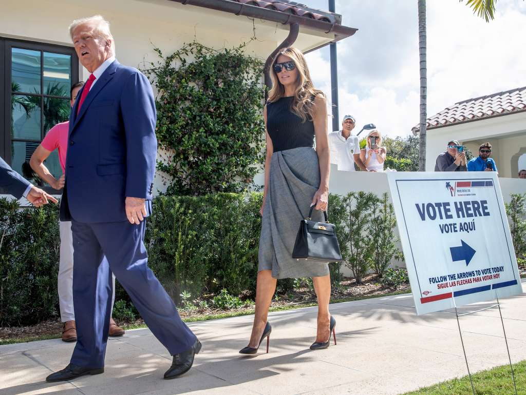 Palm Beach (United States), 08/11/2022.- Former US President Donald J. Trump (L) and former First Lady Melania Trump (R), walk out of the electoral precinct after voting in-person at the Morton and Barbara Mandel Recreation Center in Palm Beach, Florida, USA, 08 October 2022. The US midterm elections are held every four years at the midpoint of each presidential term and this year include elections for all 435 seats in the House of Representatives, 35 of the 100 seats in the Senate and 36 of the 50 state governors as well as numerous other local seats and ballot issues. (Elecciones, Estados Unidos) EFE/EPA/CRISTOBAL HERRERA-ULASHKEVICH