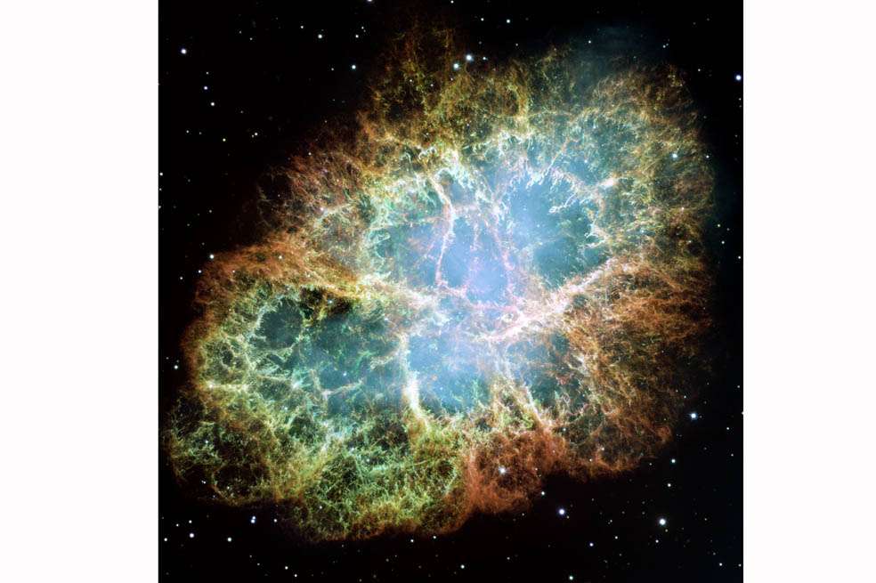 La nebulosa del Cangrejo, restos de la muerte de una estrella en la explosión de una supernova observados por el telescopio espacial Hubble.