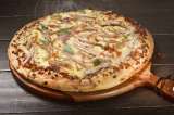 Así puede hacer una deliciosa pizza con carne de cerdo desmechada