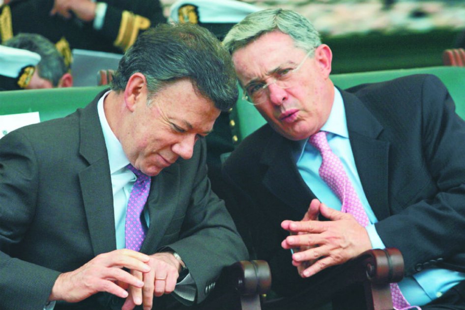 Los dos presidentes reelegidos en la última década: Juan Manuel Santos y Álvaro Uribe Vélez. / Archivo - El Espectador