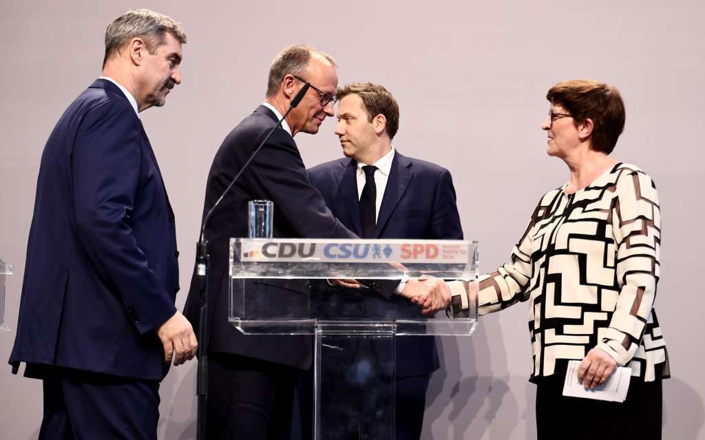 BERLIN (Germany), 09/04/2025.- (L-R) State Premier of Bavaria Markus Soeder, Chairman of the Christian Democratic Union (CDU) party and faction Friedrich Merz, Social Democratic Party (SPD) co-chairman Lars Klingbeil and SPD co-chairwoman Saskia Esken attend a press conference to present the joint coalition agreement in the German Bundestag, in Berlin, Germany, 09 April 2025. The CDU, the Christian Social Union (CSU) and the SPD have successfully concluded coalition negotiations. (Alemania) EFE/EPA/CHRISTOPH SOEDER
