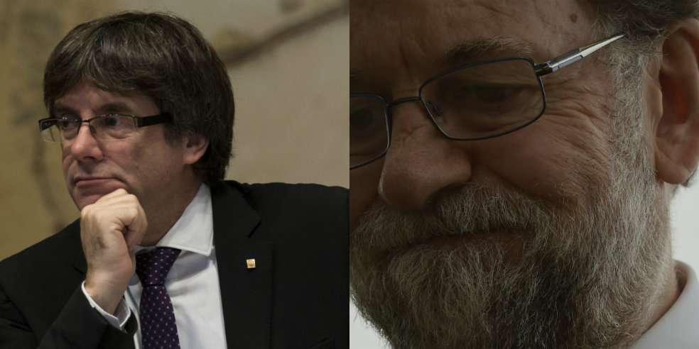 Mariano Rajoy, presidente de España y Carles Puigdemont Cataluña, jefe de gobierno catalán. / AFP