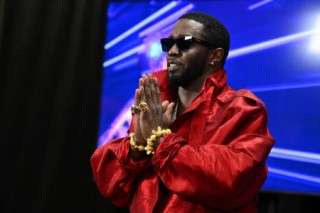 (FILES) US producer-musician Sean "Diddy" Combs gestures in the press room during the MTV Video Music Awards at the Prudential Center in Newark, New Jersey, on September 12, 2023. US prosecutors have added two charges to the criminal racketeering and sex trafficking case against Combs, according to a grand jury indictment unsealed on April 4, 2025. The superseding indictment includes an additional charge of sex trafficking and an additional charge of transportation to engage in prostitution, relating to a woman identified by prosecutors only as "Victim-2." (Photo by ANGELA WEISS / AFP)
