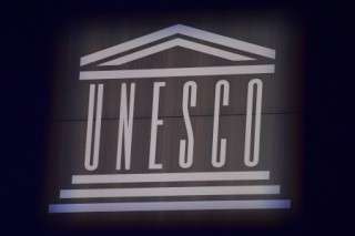 (FILES) This photograph shows the logo of UNESCO during the 75th anniversary celebrations of The United Nations Educational, Scientific and Cultural Organization (UNESCO) at UNESCO headquarters in Paris on November 12, 2021.