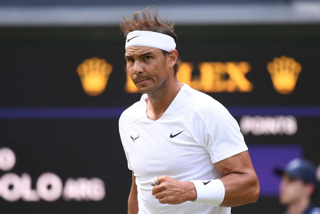 Wimbledon (United Kingdom), 28/06/2022.- Rafael Nadal of Spain celebrates a point in the men's first round match against Francisco Cerundolo of Argentina at the Wimbledon Championships, in Wimbledon, Britain, 28 June 2022. (Tenis, España, Reino Unido) EFE/EPA/ANDY RAIN EDITORIAL USE ONLY