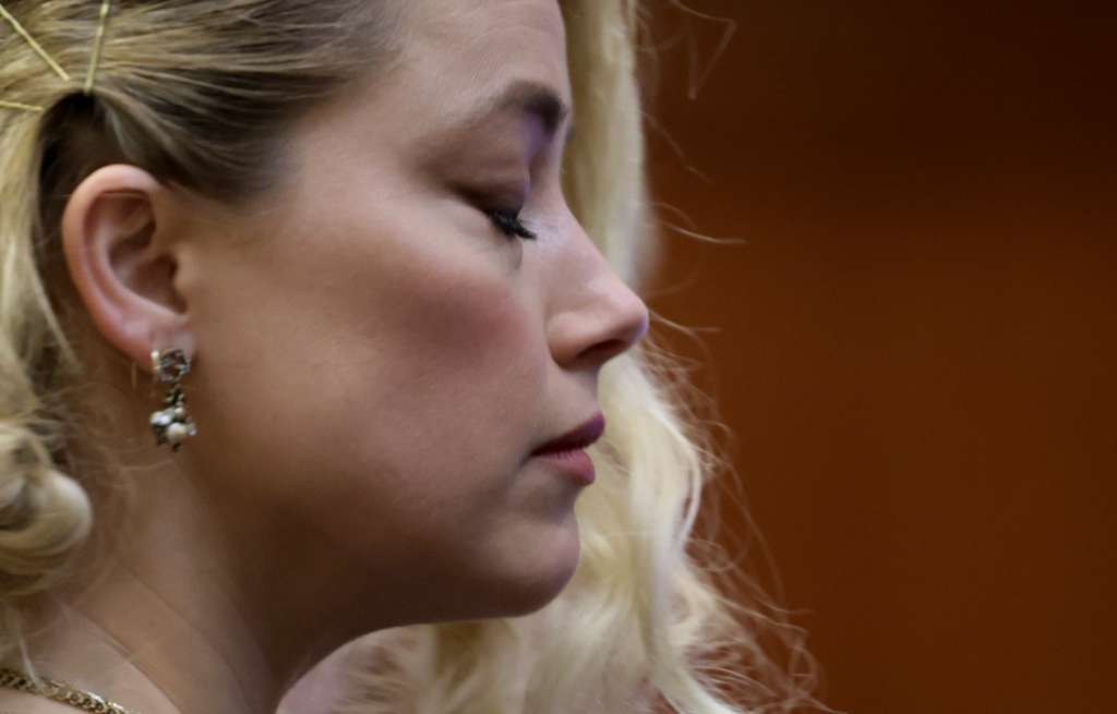 Fairfax (United States), 01/06/2022.- Actor Amber Heard waits for the jury's verdict in the Depp v. Heard civil defamation trial at the Fairfax County Circuit Courthouse in Fairfax, Virginia, USA, 01 June 2022. The jury found that US actor Johnny Depp was defamed by his ex-wife, US actor Amber Heard, in his 50 million US dollar defamation lawsuit against her and awarded him with 15 million US dollars. The jury also found that Heard was defamed by Depp through his former attorney, Adam Waldman, and awarded her with two million US dollars. (Estados Unidos) EFE/EPA/EVELYN HOCKSTEIN / POOL
