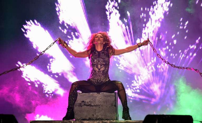 Colombian singer Shakira performs on stage during her "El Dorado World Tour" at the Azteca stadium in Mexico City, on October 11, 2018. (Photo by RODRIGO ARANGUA / AFP)