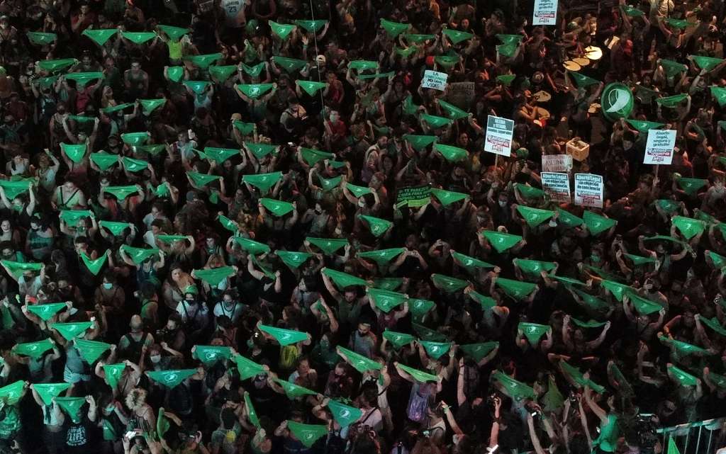 (FILES) Aerial view showing demonstrators displaying green headscarfs -symbol of abortion rights activists- outside the Argentine Congress in Buenos Aires, on December 10, 2020, as legislators debate a bill to legalize abortion.