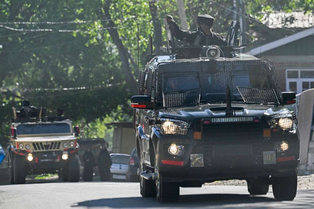 Indian army patrols on way to Hapatnar in Anantnag district south of Kashmir on April 29, 2025. (Photo by TAUSEEF MUSTAFA / AFP)