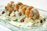 Langostinos sobre arroz de coco con fríjol y suero costeño