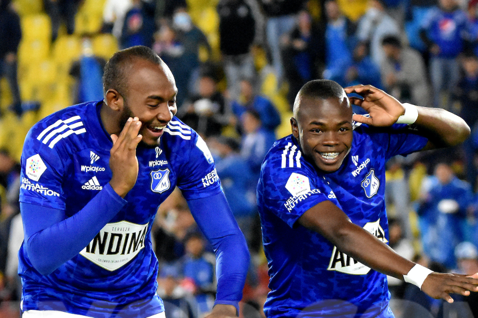 Diego Herazo y Carlos Gómez celebran una anotación contra Fortaleza. // DIMAYOR