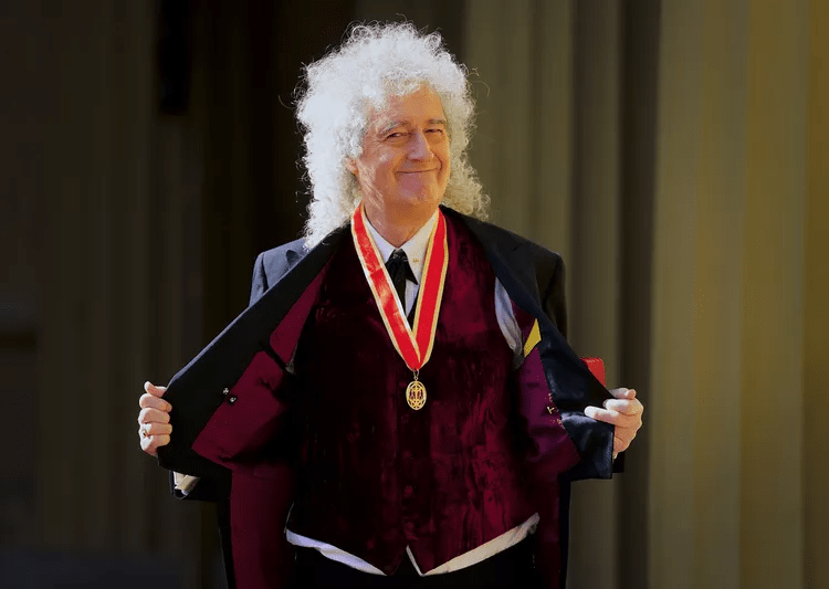 Brian May fue nombrado Caballero de la Orden del Imperio Británico, ¿por qué?