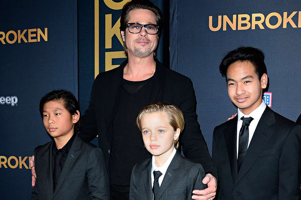 Brad Pitt con sus hijos Pax Thien, Shiloh Nouvel y Maddox el estreno de la película "Unbroken" (2014), dirigida por Angelina Jolie. / Archivo AFP