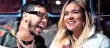 Anuel le pidió perdón a Karol G con un cartel en su concierto: ‘reina, ya basta”