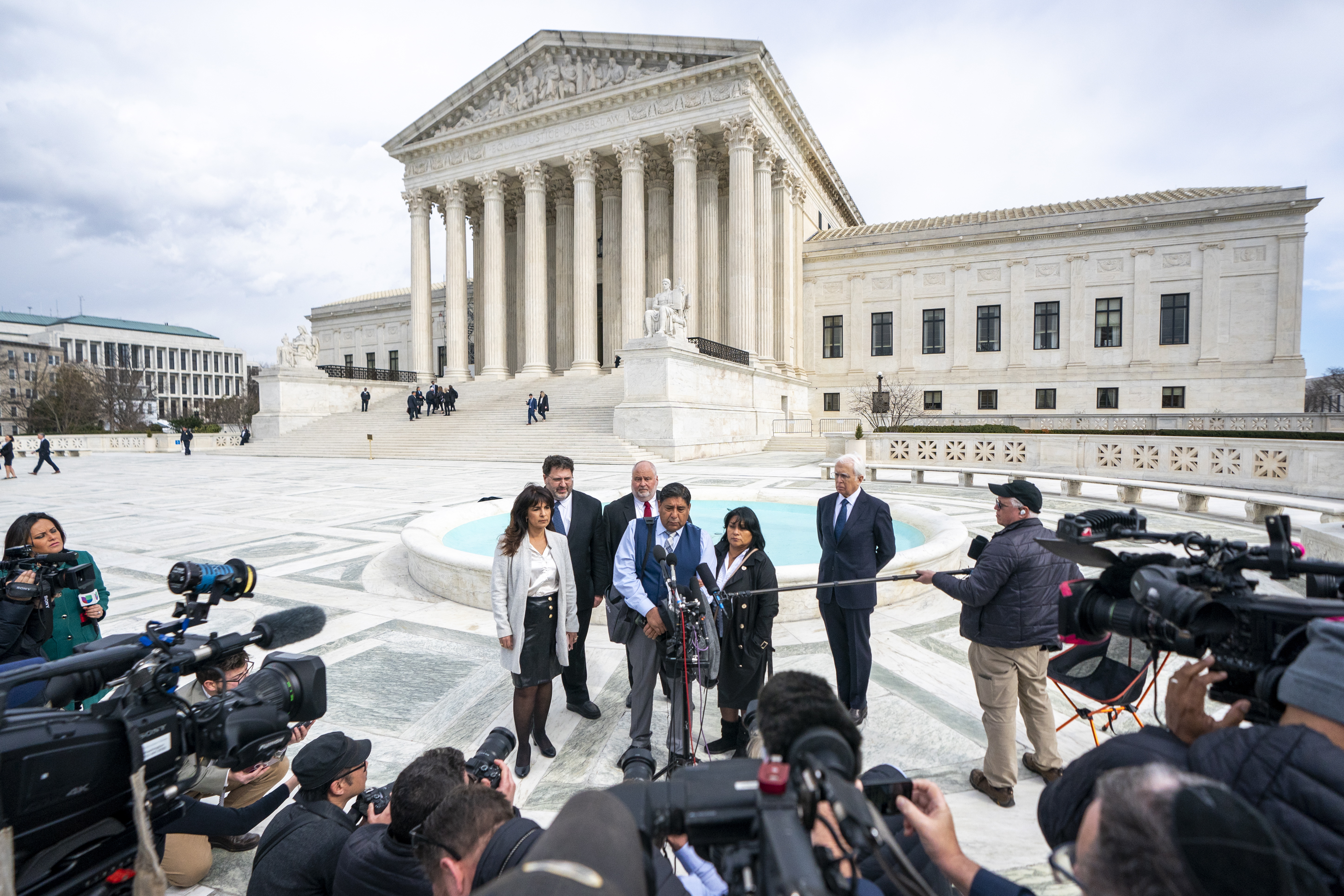 Washington (United States), 21/02/2023.- Beatriz Gonzalez (2-R), Jose Hernandez (2-L), the mother and stepfather of Nohemi Gonzalez who died in a terrorist attack in Paris in 2015, and their attorney Eric Schnapper (R) walk to speak to the news media following oral arguments in Gonzalez vs. Google, at the Supreme Court in Washington, DC, USA, 21 February 2023. Justices will consider whether tech giants can be sued for allegedly aiding ISIS terrorism. (Atentado, Terrorismo, Terrorista, Estados Unidos) EFE/EPA/SHAWN THEW