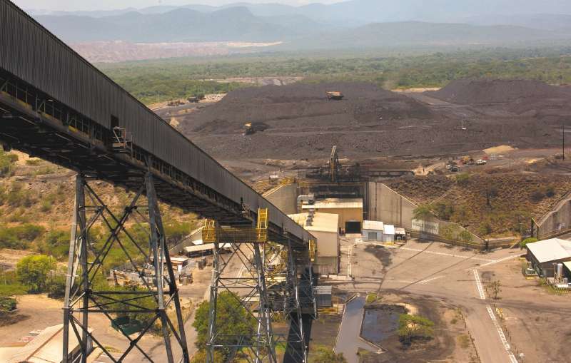 A conveyor belt moves coal at the Cerrejon Coal Mine in Barrancas, La Guajira, Colombia, on Thursday, Aug. 8, 2019. While coal demand remains strong in Asia, it's withering in North America and Europe as power generators turn increasingly to cheaper and cleaner natural gas, wind and solar power. Photographer: Nicolo Filippo Rosso/Bloomberg