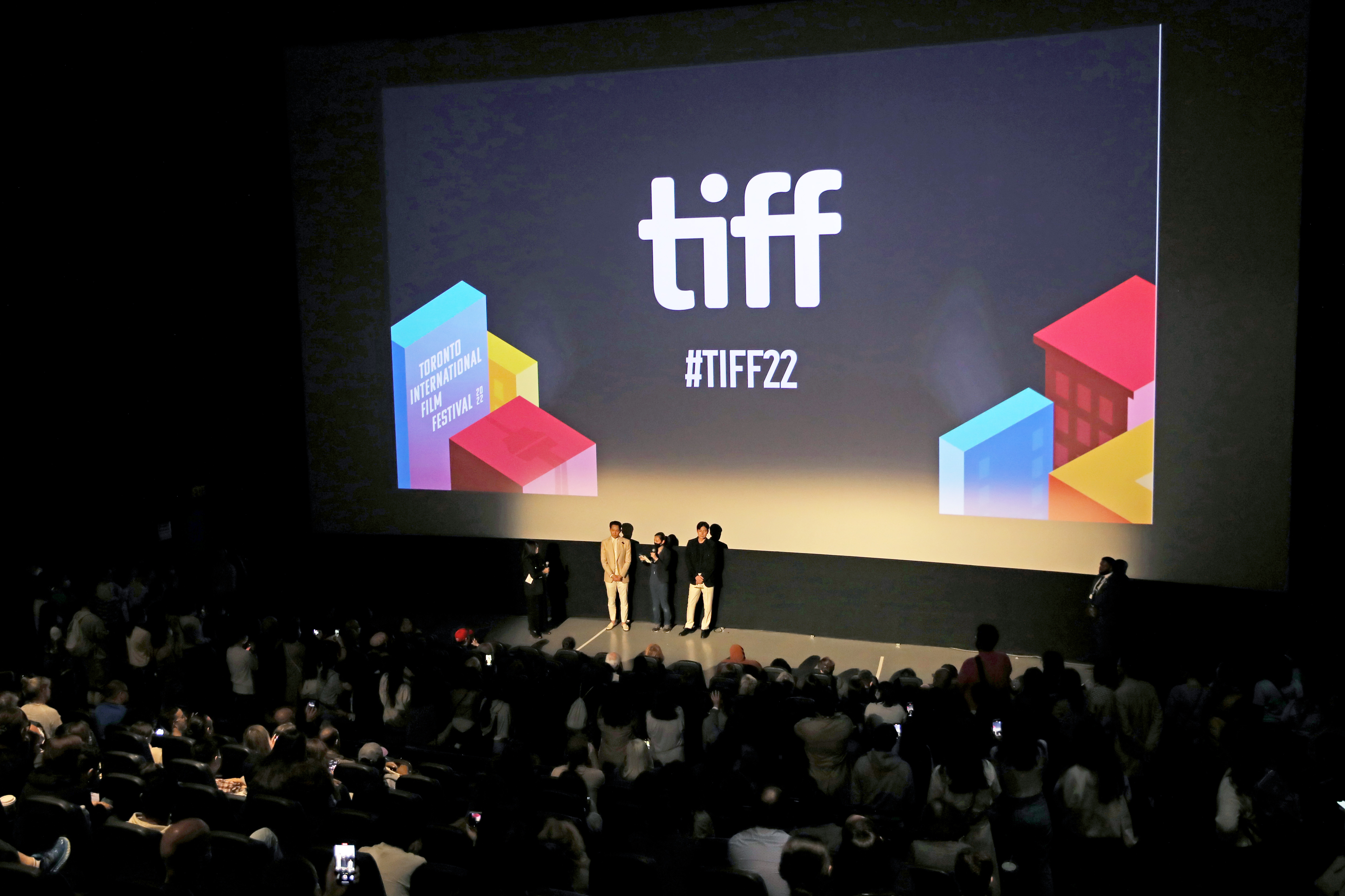 TORONTO, ONTARIO - SEPTEMBER 16: (L-R) Lee Jung-jae and Jung Woo-sung speak onstage at the "Hunt" Public Screening And Q&A during the 2022 Toronto International Film Festival at Scotiabank Theatre on September 16, 2022 in Toronto, Ontario. (Photo by Mathew Tsang/Getty Images)